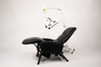 Black massage chair with control panel on a white background