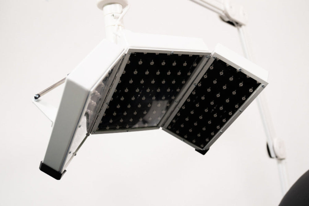 Facial red light panel with a white background