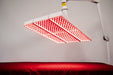 Red light therapy panel on a white background