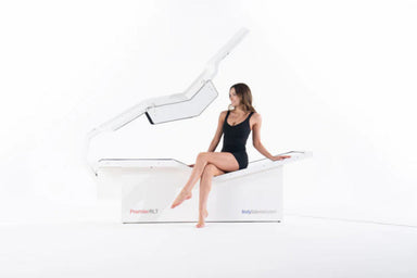 Woman sitting on The PremierRLT on a white background