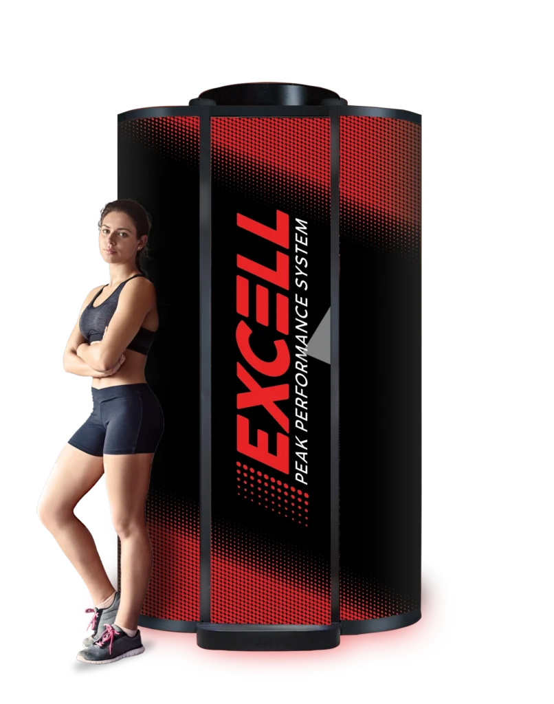 Woman standing next to EXCELL peak performance system equipment on a white background