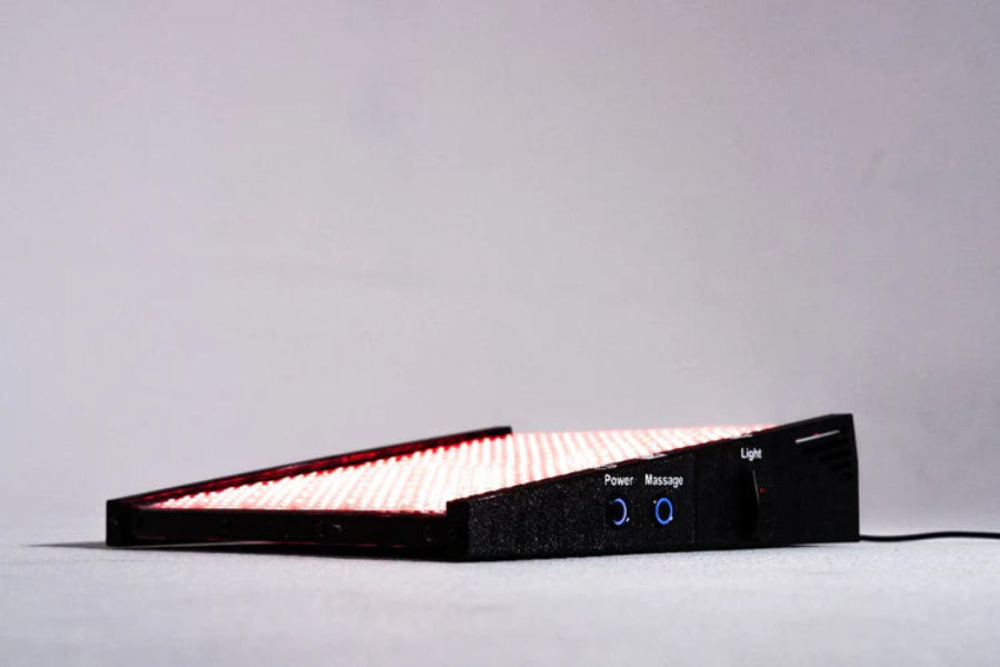 Black electronic device with LED lights on a gray background