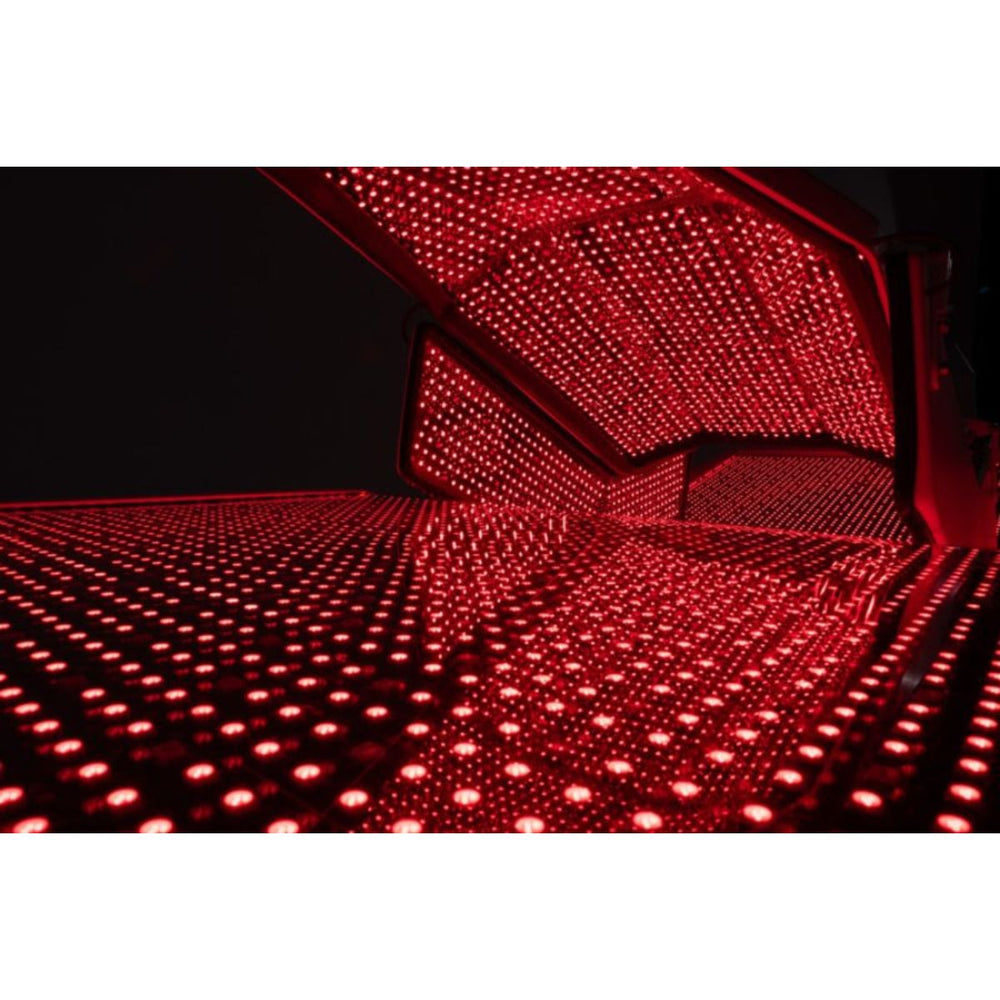 Red LED light panel on a dark background