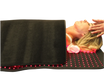 Person lying on a black mat with red LED lights, possibly for relaxation or therapy.