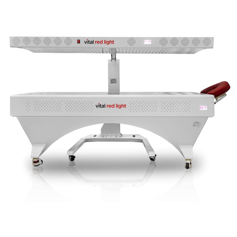 White medical device with 'vital red light' branding on a white background