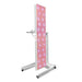 Tall, freestanding mirror with a colorful pattern on a white background